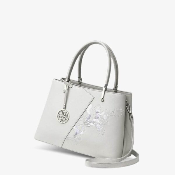 Embroidery_Leather_Magnolia_Leather_Tote_Bag_-_SinoCultural-2474118.jpg Embroidery_Leather_Magnolia_Leather_Tote_Bag_-_SinoCultural-2474118.jpg