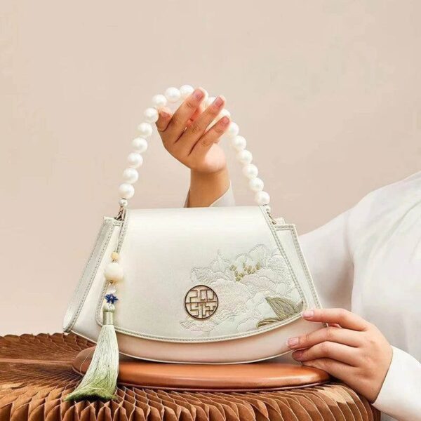 Embroidery_Leather_Vintage_White_Lotus_Handbag_with_Pendant_-_SinoCultural-2476532.jpg Embroidery_Leather_Vintage_White_Lotus_Handbag_with_Pendant_-_SinoCultural-2476532.jpg