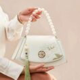 Embroidery_Leather_Vintage_White_Lotus_Handbag_with_Pendant_-_SinoCultural-2476538.jpg