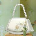 Embroidery_Leather_Vintage_White_Lotus_Handbag_with_Pendant_-_SinoCultural-2476550.jpg