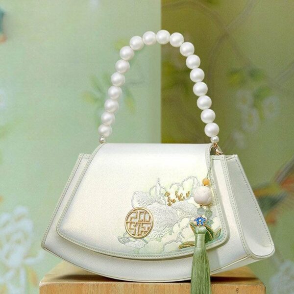 Embroidery_Leather_Vintage_White_Lotus_Handbag_with_Pendant_-_SinoCultural-2476550.jpg Embroidery_Leather_Vintage_White_Lotus_Handbag_with_Pendant_-_SinoCultural-2476550.jpg