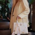 embroidery-leather-white-commuting-handbag-annamariatch-model-back.jpg