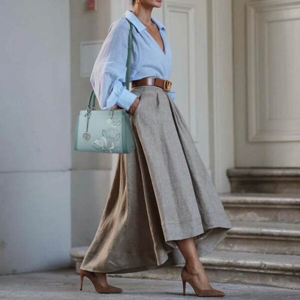 magnolia-crossbody-tote-bag-model.jpg magnolia-crossbody-tote-bag-model.jpg