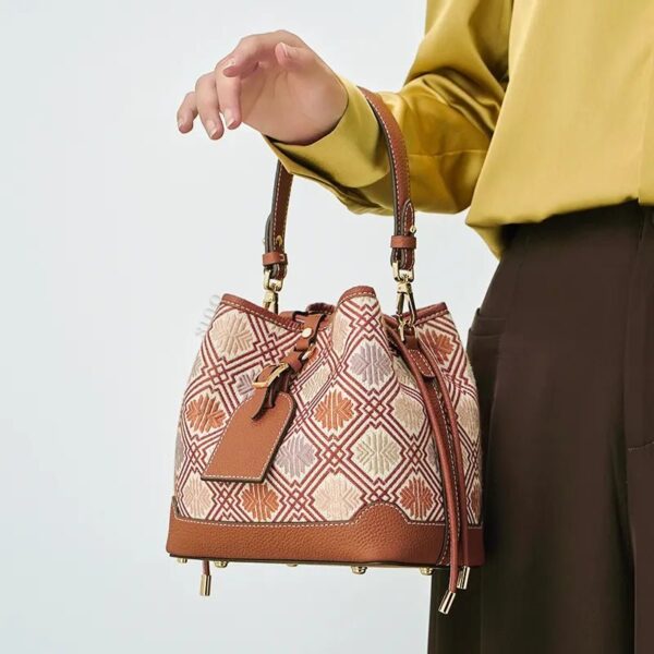 model-arm-carry-brocade-bucket-bag-front.jpg model-arm-carry-brocade-bucket-bag-front.jpg