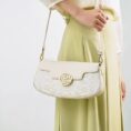 model-carrying-octagonal-brocade-bag-single-shoulder.jpg
