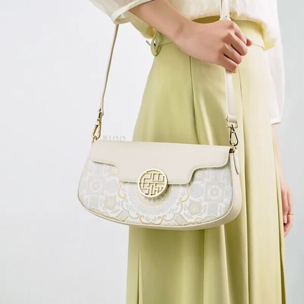 model-carrying-octagonal-brocade-bag-single-shoulder.jpg model-carrying-octagonal-brocade-bag-single-shoulder.jpg