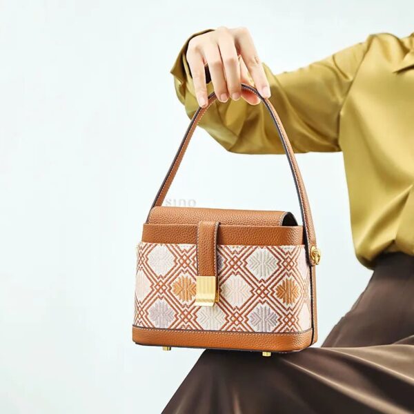 model-seated-brocade-bag-on-knees.jpg model-seated-brocade-bag-on-knees.jpg