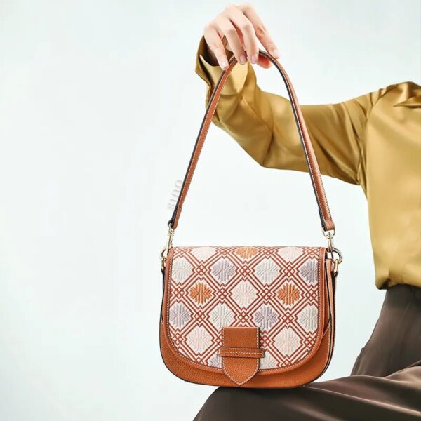 model-seated-holding-brocade-bag-on-lap.jpg model-seated-holding-brocade-bag-on-lap.jpg