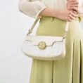 model-wearing-octagonal-brocade-bag-crossbody.jpg