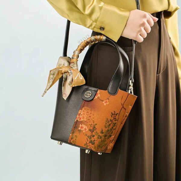 model-wearing-plum-blossom-handbag-shoulder.jpg model-wearing-plum-blossom-handbag-shoulder.jpg