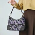 shu-brocade-shoulder-bag-classic-phoenix-peony-motif-model-handheld.jpg