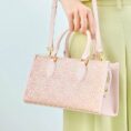 song-brocade-leather-handbag-pink-gold-dingsheng-motif-model-shoulder-handheld.jpg
