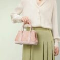 song-brocade-pink-dingsheng-crossbody-bag-model-green-dress-handheld.jpg