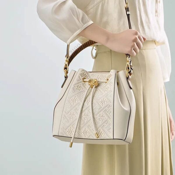 wanj-pattern-embroidered-leather-convertible-backpack-tote-model-shoulder-handheld.jpg wanj-pattern-embroidered-leather-convertible-backpack-tote-model-shoulder-handheld.jpg