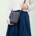 zhuang-brocade-bucket-crossbody-bag-model-blue-dress-crossbody.jpg