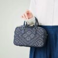zhuang-brocade-flying-swallow-embroidered-leather-crossbody-bag-model-blue-dress-handheld.jpg
