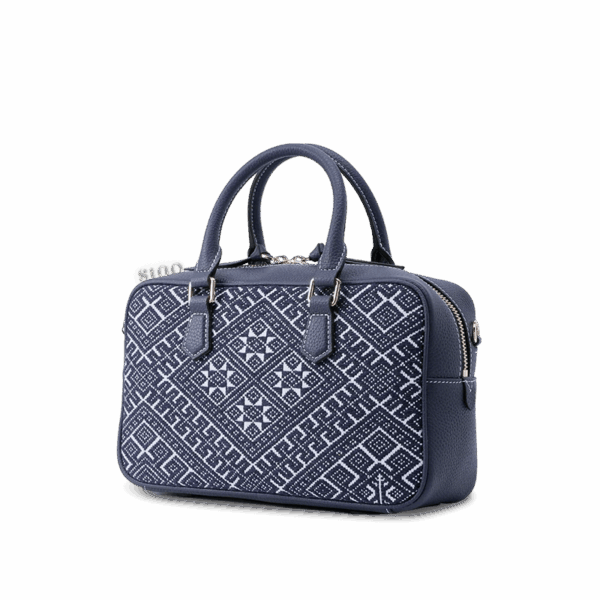 zhuang-brocade-flying-swallow-embroidered-leather-crossbody-bag-side-view.png zhuang-brocade-flying-swallow-embroidered-leather-crossbody-bag-side-view.png