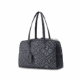 zhuang-brocade-flying-swallow-leather-handbag-diagonal-view.png