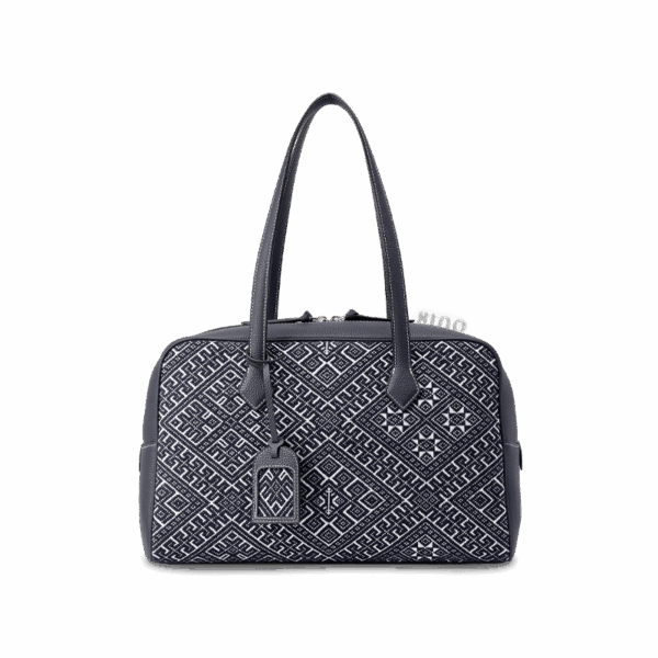 zhuang-brocade-flying-swallow-leather-handbag-front-view.png